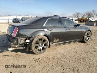 2013 Chrysler 300 SRT-8 with VIN 2C3CCAFJ8DH646483, listed as a Copart auction lot 83261144 with 86,015 mi miles and Salvage Title. Bid and sale history available at DreamBid. Image 3.