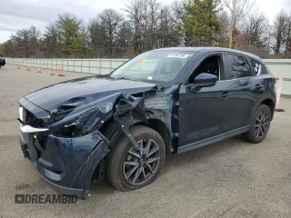 2018 Mazda CX-5 Touring with VIN JM3KFBCM6J0399913, listed as a Copart auction lot 51295705 with 88,599 mi miles and Salvage Title. Bid and sale history available at carsss.com. Image 1.