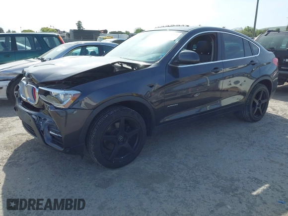 2015 BMW X4 xDrive28i z VIN 5UXXW3C54F0M87412, wystawiony jako IAAI lot #42038938 z przebiegiem 106 461 mil mil oraz . Historia ofert i sprzedaży dostępna na DreamBid. Obrazek 2.