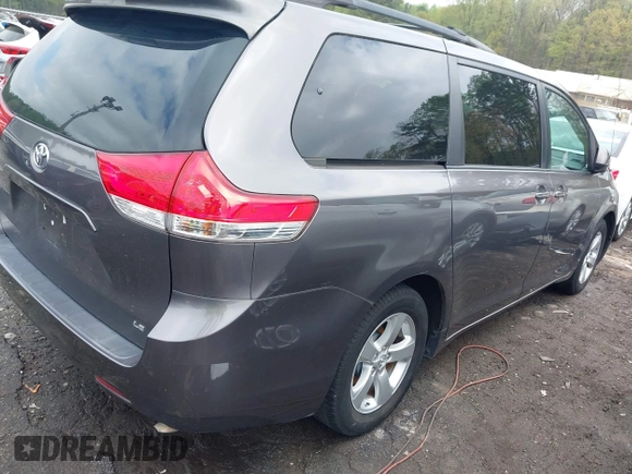 2014 Toyota Sienna LE AAS with VIN 5TDKK3DC3ES506466, listed as a IAAI auction lot 41908023 with 118,297 mi miles and . Bid and sale history available at carsss.com. Image 4.