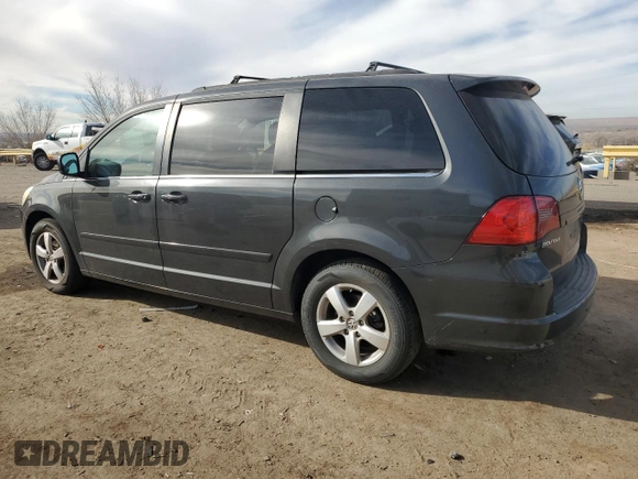 2011 Volkswagen Routan SE with VIN 2V4RW3DGXBR642528, listed as a Copart auction lot 45082055 with 167,067 mi miles and Salvage title. Bid and sale history available at DreamBid. Image 2.