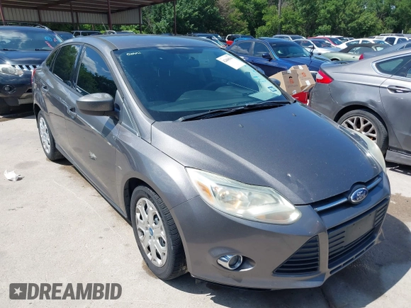 2012 Ford Focus SE with VIN 1FAHP3F28CL211898, listed as a IAAI auction lot 42466544 with 142,933 mi miles and . Bid and sale history available at DreamBid. Image 1.