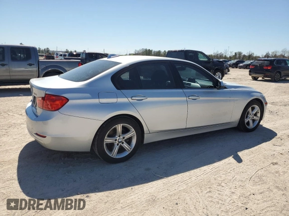 2013 BMW 3 Series 320i with VIN WBA3B1C50DK128525, listed as a Copart auction lot 48618015 with 124,304 mi miles and Salvage Title. Bid and sale history available at carsss.com. Image 3.