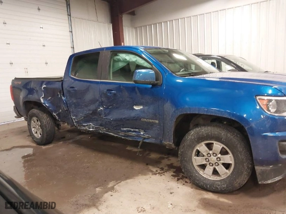 2020 Chevrolet Colorado 4WD Work Truck with VIN 1GCGTBEN3L1162483, listed as a IAAI auction lot 41629658 with 74,416 mi miles. Bid and sale history available at carsss.com. Image 6.