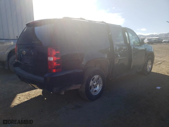 2014 Chevrolet Suburban LT with VIN 1GNSKJE73ER246291, listed as a Copart auction lot 74231304 with 140,688 mi miles and Salvage Title. Bid and sale history available at carsss.com. Image 5.