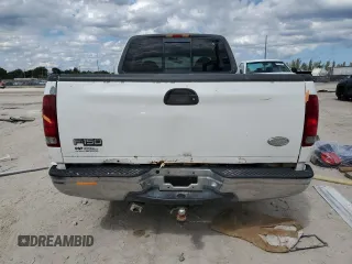 2000 Ford F-150 XL with VIN 1FTRX17L4YNA81687, listed as a Copart auction lot 46996675 with 0 mi miles and Salvage Title. Bid and sale history available at carsss.com. Image 6.