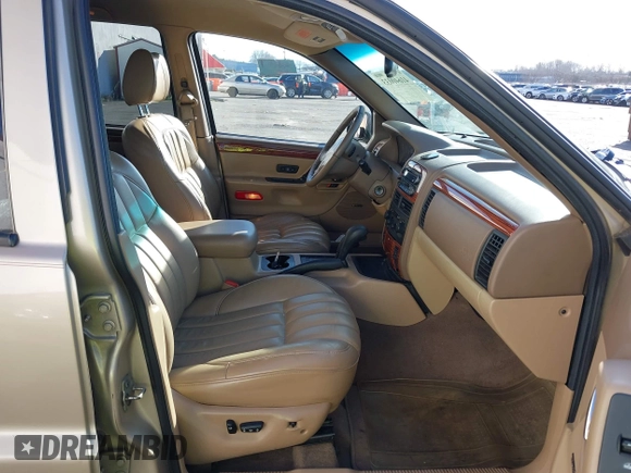 1999 Jeep Grand Cherokee Limited with VIN 1J4GW68N3XC688112, listed as a IAAI auction lot 41640033 with 196,851 mi miles. Bid and sale history available at carsss.com. Image 5.