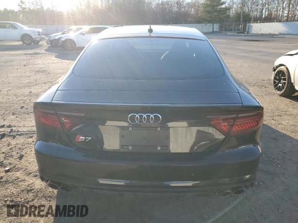 2018 Audi S7 Prestige z VIN WAU2FAFC1JN003800, wystawiony jako Copart lot #40875184 z przebiegiem 65 945 mil mil oraz . Historia ofert i sprzedaży dostępna na DreamBid. Obrazek 6.