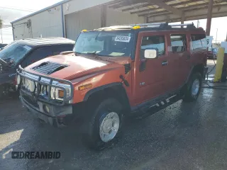 2003 Hummer H2 with VIN 5GRGN23U73H141713, listed as a Copart auction lot 84285624 with 152,719 mi miles and Non Repairable. Bid and sale history available at carsss.com. Image 1.