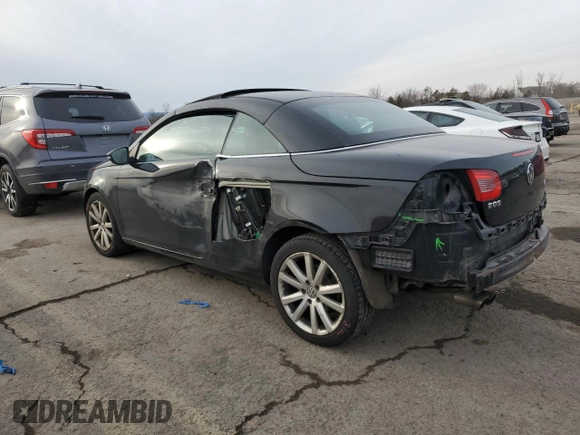 2011 Volkswagen Eos Komfort with VIN WVWBW7AH2BV003962, listed as a Copart auction lot 43893545 with 148,349 mi miles and Salvage Title. Bid and sale history available at DreamBid. Image 2.