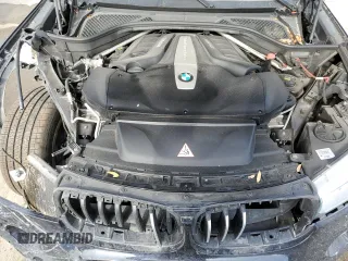 2015 BMW X6 xDrive50i with VIN 5UXKU6C56F0F93641, listed as a Copart auction lot 77233553 with 71,409 mi miles. Bid and sale history available at carsss.com. Image 12.