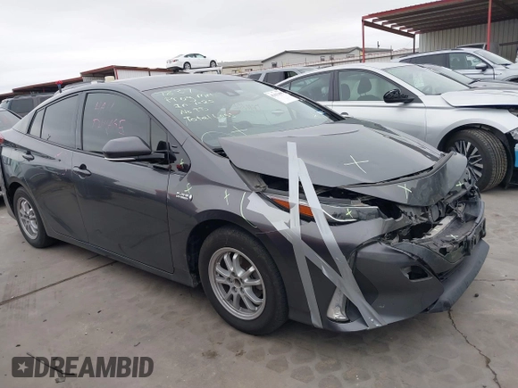2018 Toyota Prius Plus with VIN JTDKARFPXJ3087064, listed as a IAAI auction lot 41433495 with 118,298 mi miles and . Bid and sale history available at DreamBid. Image 13.