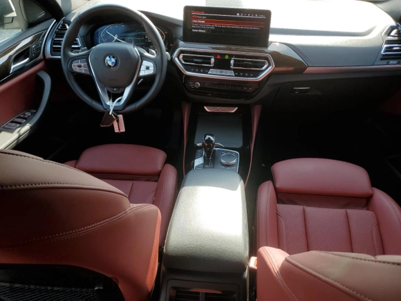 2024 BMW X4 xDrive30i z VIN 5UX33DT09R9U71062, wystawiony jako Copart lot #52200375 z przebiegiem 21 979 mil mil oraz Szkoda całkowita • Salvage title. Historia ofert i sprzedaży dostępna na DreamBid. Obrazek 8.