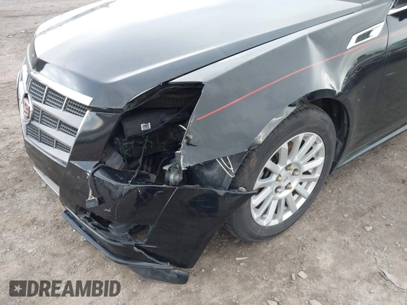 2011 Cadillac CTS z VIN 1G6DC5EY1B0156347, wystawiony jako IAAI lot #41496903 z przebiegiem 128 304 mil mil oraz . Historia ofert i sprzedaży dostępna na DreamBid. Obrazek 6.