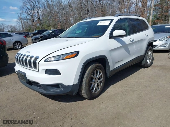 2015 Jeep Cherokee Latitude with VIN 1C4PJMCS1FW795579, listed as a IAAI auction lot 41661163 with 108,246 mi miles. Bid and sale history available at carsss.com. Image 2.