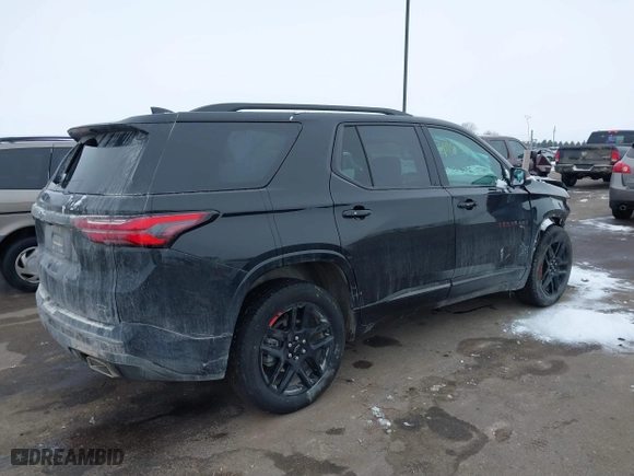 2023 Chevrolet Traverse Premier with VIN 1GNEVKKW3PJ324995, listed as a IAAI auction lot 41187313 with 14,701 mi miles. Bid and sale history available at carsss.com. Image 4.