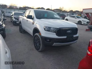 2021 Ford Ranger XL with VIN 1FTER4EH8MLD51163, listed as a IAAI auction lot 41231119 with 26,992 mi miles. Bid and sale history available at carsss.com. Image 1.