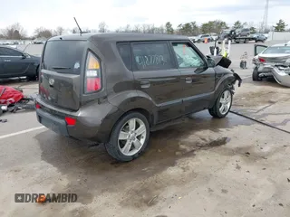 2010 Kia Soul + with VIN KNDJT2A21A7159044, listed as a IAAI auction lot 41877813 with 121,814 mi miles. Bid and sale history available at carsss.com. Image 4.