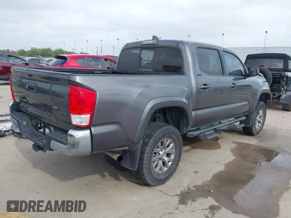 2017 Toyota Tacoma SR5 with VIN 5TFAZ5CN4HX047095, listed as a IAAI auction lot 41951364 with 127,706 mi miles and . Bid and sale history available at DreamBid. Image 4.
