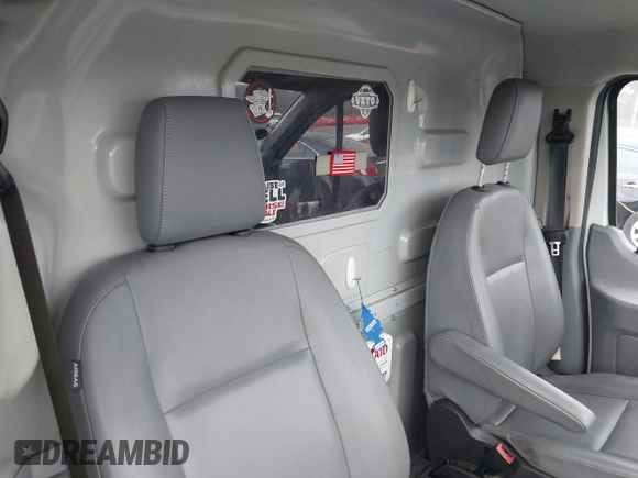 2018 Ford Transit with VIN 1FTYE1ZMXJKB56181, listed as a IAAI auction lot 42000183 with 113,112 mi miles and . Bid and sale history available at DreamBid. Image 8.