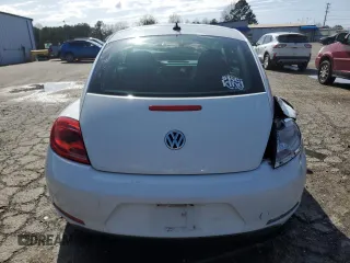 2014 Volkswagen Beetle 1.8T z VIN 3VWJ17AT1EM665073, wystawiony jako Copart lot #47805405 z przebiegiem 92 303 mil mil oraz Szkoda całkowita • Salvage title. Historia ofert i sprzedaży dostępna na DreamBid. Obrazek 6.