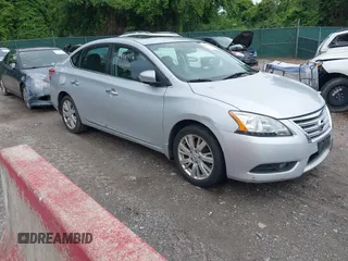 2014 Nissan Sentra SR z VIN 3N1AB7APXEY209345, wystawiony jako IAAI lot #42378706 z przebiegiem 132 705 mil mil oraz . Historia ofert i sprzedaży dostępna na DreamBid. Obrazek 1.