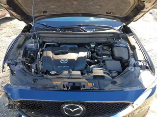 2021 Mazda CX-5 Grand Touring with VIN JM3KFADM5M0428279, listed as a IAAI auction lot 41747175 with 49,579 mi miles. Bid and sale history available at carsss.com. Image 10.