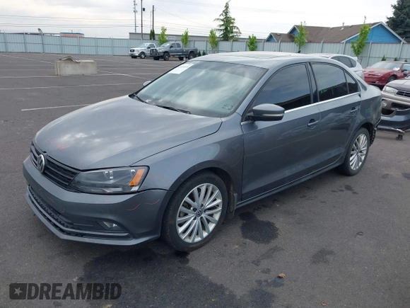 2015 Volkswagen Jetta SE with VIN 3VWD17AJXFM318080, listed as a IAAI auction lot 42119974 with 169,463 mi miles and . Bid and sale history available at DreamBid. Image 2.