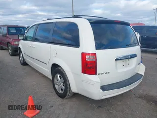 2010 Dodge Grand Caravan SXT with VIN 2D4RN5D17AR444818, listed as a IAAI auction lot 40941591 with Not Provided miles and . Bid and sale history available at DreamBid. Image 3.