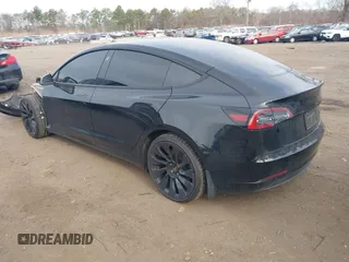 2023 Tesla Model 3 Long Range with VIN 5YJ3E1EB6PF673532, listed as a IAAI auction lot 41885716 with 39,690 mi miles and . Bid and sale history available at DreamBid. Image 3.