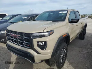 2023 GMC Canyon 4WD AT4 with VIN 1GTP6DEK3P1151112, listed as a Copart auction lot 77150454 with 5,573 mi miles and Non Repairable. Bid and sale history available at carsss.com. Image 1.