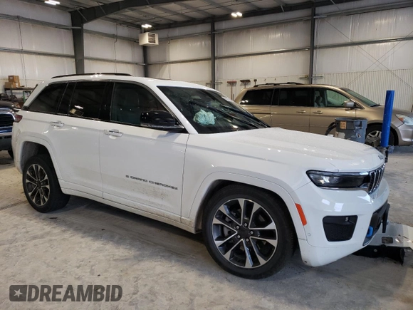 2022 Jeep Grand Cherokee Overland with VIN 1C4RJYD68N8716557, listed as a Copart auction lot 86807614 with 12,590 mi miles and Salvage title. Bid and sale history available at DreamBid. Image 4.