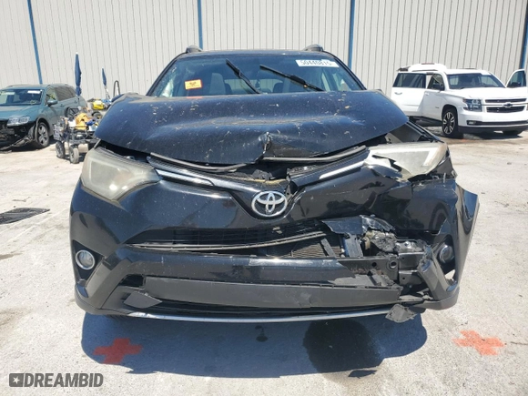 2016 Toyota RAV4 XLE with VIN 2T3WFREV7GW284850, listed as a Copart auction lot 50440815 with 133,409 mi miles and Salvage Title. Bid and sale history available at carsss.com. Image 5.