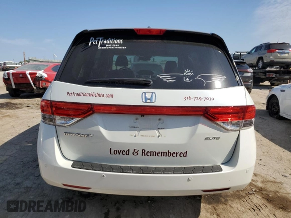 2014 Honda Odyssey Touring z VIN 5FNRL5H92EB059168, wystawiony jako Copart lot #76121914 z przebiegiem 264 715 mil mil oraz Szkoda całkowita • Salvage title. Historia ofert i sprzedaży dostępna na DreamBid. Obrazek 6.