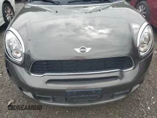 2011 MINI Countryman S z VIN WMWZC5C56BWL53827, wystawiony jako Copart lot #58953505 z przebiegiem Nie podano mil oraz Szkody całkowita. Historia ofert i sprzedaży dostępna na DreamBid. Obrazek 11.