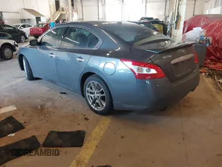 2011 Nissan Maxima SV with VIN 1N4AA5AP5BC833150, listed as a IAAI auction lot 41963937 with 176,089 mi miles and . Bid and sale history available at DreamBid. Image 3.
