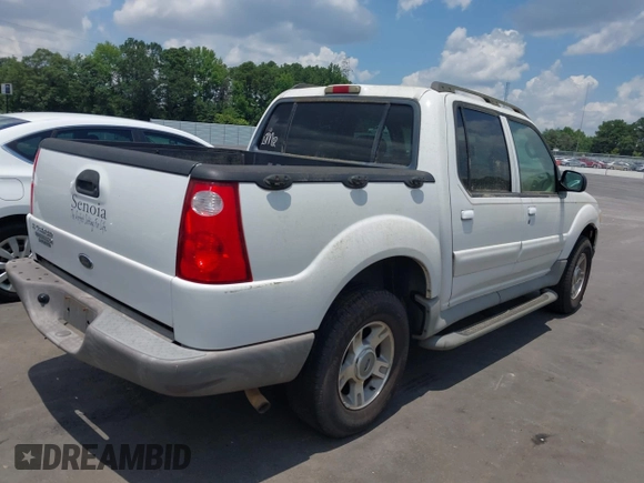2003 Ford Explorer Sport Trac XLS z VIN 1FMZU67E63UB48999, wystawiony jako IAAI lot #42696231 z przebiegiem 86 900 mil mil oraz . Historia ofert i sprzedaży dostępna na DreamBid. Obrazek 4.