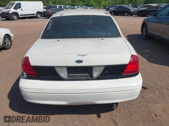 2001 Ford Crown Victoria Police Interceptor z VIN 2FAFP71W21X165218, wystawiony jako IAAI lot #42062199 z przebiegiem 233 978 mil mil oraz . Historia ofert i sprzedaży dostępna na DreamBid. Obrazek 16.