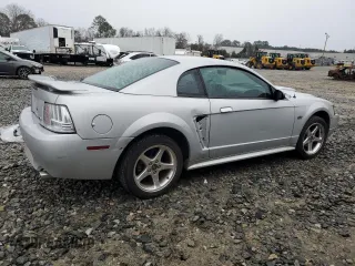2003 Ford Mustang GT Deluxe with VIN 1FAFP42X33F380899, listed as a Copart auction lot 42158555 with 142,086 mi miles and Salvage Title. Bid and sale history available at carsss.com. Image 3.
