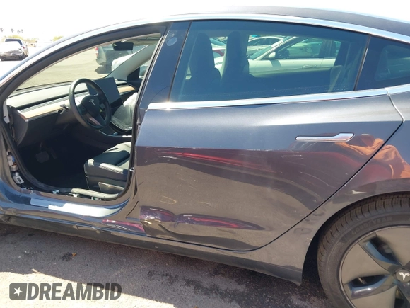 2019 Tesla Model 3 Long Range with VIN 5YJ3E1EB9KF386047, listed as a IAAI auction lot 42215362 with 41,246 mi miles and . Bid and sale history available at DreamBid. Image 15.