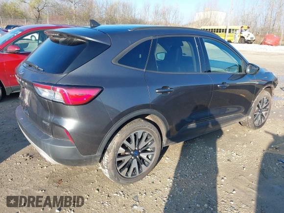2020 Ford Escape SE Sport Hybrid with VIN 1FMCU9BZ3LUC23532, listed as a IAAI auction lot 40749554 with 96,291 mi miles and . Bid and sale history available at DreamBid. Image 4.