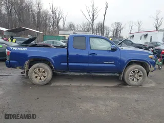 2022 Toyota Tacoma 4WD SR with VIN 3TYSZ5AN1NT098292, listed as a IAAI auction lot 41145029 with 48,853 mi miles. Bid and sale history available at carsss.com. Image 13.