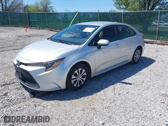 2021 Toyota Corolla Hybrid LE with VIN JTDEAMDE5MJ022110, listed as a IAAI auction lot 41912920 with 59,198 mi miles. Bid and sale history available at carsss.com. Image 18.