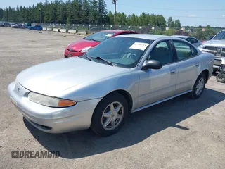 2004 Oldsmobile Alero GL1 z VIN 1G3NL52F84C227601, wystawiony jako IAAI lot #42388215 z przebiegiem 241 229 mil mil oraz . Historia ofert i sprzedaży dostępna na DreamBid. Obrazek 2.