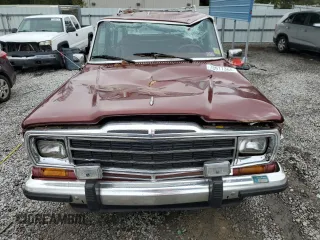 1986 Jeep Grand Wagoneer z VIN 1JCNJ15U6GT029563, wystawiony jako Copart lot #78917364 z przebiegiem 115 025 mil mil oraz Szkoda całkowita • Salvage title. Historia ofert i sprzedaży dostępna na DreamBid. Obrazek 5.
