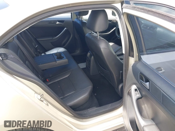 2014 Volkswagen Jetta SE with VIN 3VWD17AJ9EM271431, listed as a IAAI auction lot 42419304 with 143,599 mi miles and . Bid and sale history available at DreamBid. Image 8.