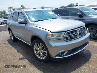 2015 Dodge Durango Citadel with VIN 1C4RDJEG9FC710304, listed as a IAAI auction lot 42473811 with 118,662 mi miles and . Bid and sale history available at DreamBid. Image 1.