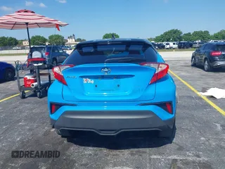 2019 Toyota C-HR XLE with VIN NMTKHMBX6KR097934, listed as a IAAI auction lot 39276687 with 56,973 mi miles. Bid and sale history available at carsss.com. Image 15.
