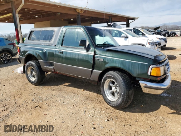 1997 Ford Ranger XLT with VIN 1FTCR10AXVPB26107, listed as a Copart auction lot 49113425 with 148,630 mi miles and Salvage Title. Bid and sale history available at DreamBid. Image 4.
