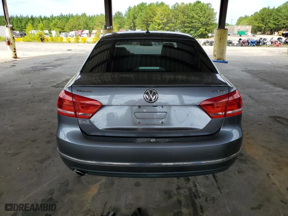 2015 Volkswagen Passat 1.8T Sport with VIN 1VWBT7A35FC009590, listed as a Copart auction lot 69564634 with 61,959 mi miles and Salvage Title. Bid and sale history available at carsss.com. Image 6.